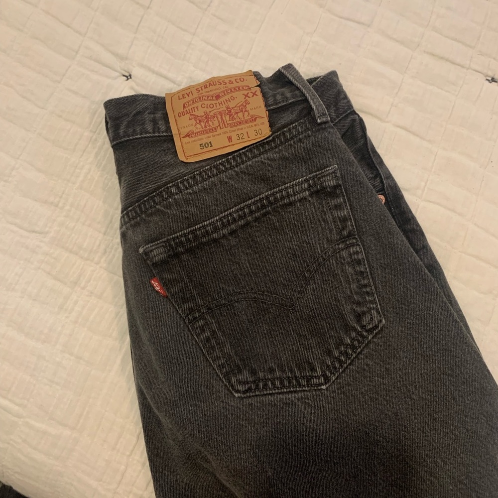 2 pairs of identical Vintage black Levi’s straight leg jeans